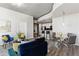 Stylish living room featuring a modern sofa, chairs, and an open-concept dining area at 361 17Th Nw St # 1603, Atlanta, GA 30363