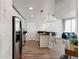Bright living space featuring an open layout, seamlessly blending the kitchen, dining, and living areas for modern living at 361 17Th Nw St # 1603, Atlanta, GA 30363