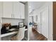 Cozy home office nook with built-in desk and cabinets, next to the main entrance at 361 17Th Nw St # 1603, Atlanta, GA 30363