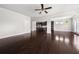 Open-concept living room with hardwood floors, recessed lighting, and an easy flow to the kitchen at 6660 Country Lake Rd, Cumming, GA 30041