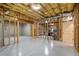 Unfinished basement with exposed framing, ready for customization at 13037 Overlook Pass, Roswell, GA 30075