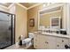 Bathroom includes a granite countertop, single vanity, and a walk-in shower at 13037 Overlook Pass, Roswell, GA 30075