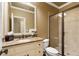 Bathroom featuring a granite counter, white vanity and shower with glass doors at 13037 Overlook Pass, Roswell, GA 30075