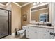 Beautiful bathroom with granite countertop, white vanity, and glass shower at 13037 Overlook Pass, Roswell, GA 30075