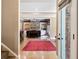 Grand entryway view leading into a cozy living room with a stone fireplace at 13037 Overlook Pass, Roswell, GA 30075