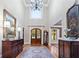 Grand foyer with high ceilings, chandelier, hardwood floors and elegant decor at 13037 Overlook Pass, Roswell, GA 30075