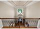 Grand foyer with high ceilings, chandelier, and hardwood floors, creating a welcoming entrance at 13037 Overlook Pass, Roswell, GA 30075
