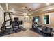 Bright home gym with workout equipment and a view of the backyard at 13037 Overlook Pass, Roswell, GA 30075