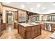 Spacious kitchen with a large island, stainless steel appliances, and custom cabinetry at 13037 Overlook Pass, Roswell, GA 30075