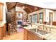Inviting living room showcasing wood ceiling, fireplace, and built-in shelving at 13037 Overlook Pass, Roswell, GA 30075