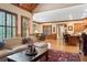 Spacious living room with wood trim, shutters and hardwood floors at 13037 Overlook Pass, Roswell, GA 30075