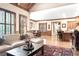 Open concept living room connected to the kitchen, featuring hardwood floors and natural light at 13037 Overlook Pass, Roswell, GA 30075