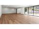 Open basement features hardwood floors and sliding door leading to backyard at 375 Chattahoochee St, Roswell, GA 30075