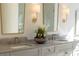 Luxurious bathroom with double vanity, marble countertop, and stylish fixtures at 375 Chattahoochee St, Roswell, GA 30075