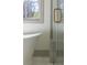 Modern bathroom featuring a soaking tub and glass shower, a spa-like experience at 375 Chattahoochee St, Roswell, GA 30075
