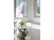 Bright bathroom showcasing a freestanding tub and elegant decor at 375 Chattahoochee St, Roswell, GA 30075