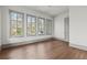 Spacious bedroom with natural light and hardwood floors, offering a bright and airy feel at 375 Chattahoochee St, Roswell, GA 30075