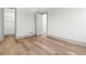 Bedroom with modern flooring, neutral walls, and closet access at 375 Chattahoochee St, Roswell, GA 30075