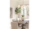 Cozy dining area illuminated by a stylish chandelier, perfect for entertaining at 375 Chattahoochee St, Roswell, GA 30075