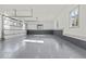 A clean, spacious garage offers ample parking and storage with a modern, finished interior at 375 Chattahoochee St, Roswell, GA 30075