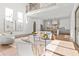 Open concept living area with modern furnishings and a view of the kitchen at 375 Chattahoochee St, Roswell, GA 30075
