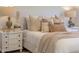 Cozy main bedroom with layered textiles, bedside lamps, and a bright, airy ambiance at 375 Chattahoochee St, Roswell, GA 30075