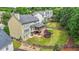 Expansive backyard featuring lush landscaping, a large deck, and ample space for outdoor enjoyment at 1037 Panoramic Pte, Buford, GA 30518