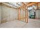 Unfinished basement with exposed insulation and concrete floor, offering potential for customization at 1037 Panoramic Pte, Buford, GA 30518