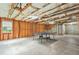 Unfinished basement with high ceilings, exposed insulation, and space for activities like ping pong at 1037 Panoramic Pte, Buford, GA 30518