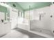 Renovated bathroom with soaking tub, walk-in shower, and modern fixtures at 1037 Panoramic Pte, Buford, GA 30518