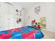 A bedroom with a Spider-Personal bed, closet doors, and decor at 1037 Panoramic Pte, Buford, GA 30518