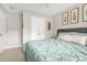 A bedroom featuring a large comfortable-looking bed at 1037 Panoramic Pte, Buford, GA 30518