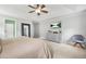 Primary bedroom boasts a tray ceiling, neutral decor, and calming aesthetics at 1037 Panoramic Pte, Buford, GA 30518