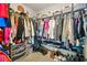 Walk-in closet featuring ample shelving and hanging space at 1037 Panoramic Pte, Buford, GA 30518