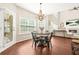 Charming dining area bathed in natural light with seamless access to the living room and outdoor spaces at 1037 Panoramic Pte, Buford, GA 30518