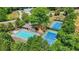 Aerial view of the community pool and tennis courts, perfect for recreation and relaxation at 1037 Panoramic Pte, Buford, GA 30518