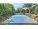 A pristine tennis court available for residents, set within a beautifully landscaped community at 1037 Panoramic Pte, Buford, GA 30518