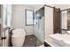 Modern bathroom with a freestanding tub, walk-in shower, and designer tile at 1393 Westview Sw Dr, Atlanta, GA 30310