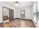 Unstaged bedroom with gray trim and ensuite bathroom at 1393 Westview Sw Dr, Atlanta, GA 30310