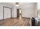 Large bedroom featuring a walk-in closet, and a modern air conditioner at 1393 Westview Sw Dr, Atlanta, GA 30310