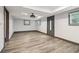 Spacious open living area has lots of natural light and wood-look flooring at 1393 Westview Sw Dr, Atlanta, GA 30310