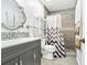 Modern bathroom with a tiled shower and stylish vanity at 2107 Sandtree Sw Ct, Atlanta, GA 30331