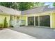 Charming home featuring a cozy front porch and a two-car garage at 2107 Sandtree Sw Ct, Atlanta, GA 30331