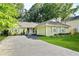 Charming single-story home with a well-manicured lawn and inviting curb appeal at 2107 Sandtree Sw Ct, Atlanta, GA 30331