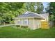 Cozy single-story home featuring a well-kept lawn and traditional design elements at 2107 Sandtree Sw Ct, Atlanta, GA 30331