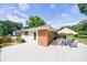Enjoy outdoor living on this deck with room for dining under an umbrella and partially fenced yard at 3060 Wilson Rd, Decatur, GA 30033