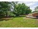 Expansive backyard featuring a seating area and lush greenery, great for outdoor gatherings and relaxing at 3060 Wilson Rd, Decatur, GA 30033