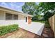 Backyard patio and deck with mature trees at 3060 Wilson Rd, Decatur, GA 30033