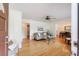 Inviting living room features hardwood floors, neutral paint, ceiling fan, and ample natural light at 3060 Wilson Rd, Decatur, GA 30033