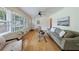 Spacious living room features hardwood floors, neutral paint, ceiling fan, and a cozy atmosphere at 3060 Wilson Rd, Decatur, GA 30033